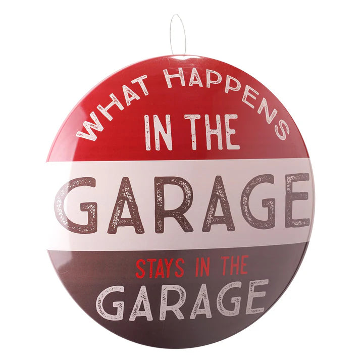 What Happens in the Garage Domed Metal Sign