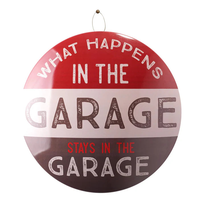 What Happens in the Garage Domed Metal Sign